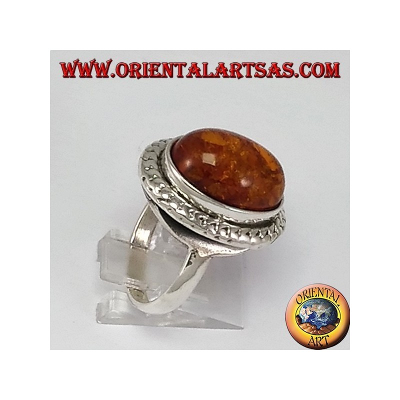Silver ring with large oval amber