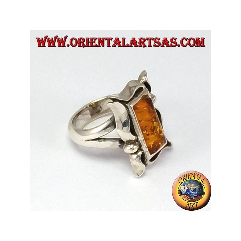Silver ring with rectangular amber in frame