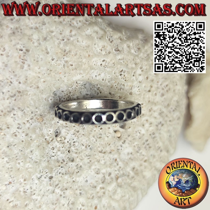 Bague en argent avec cercles superposés alignés côte à côte