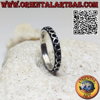 Bague en argent avec cercles superposés alignés côte à côte