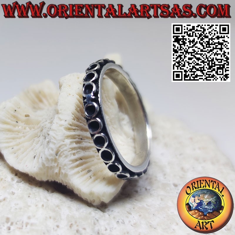 Bague en argent avec cercles superposés alignés côte à côte