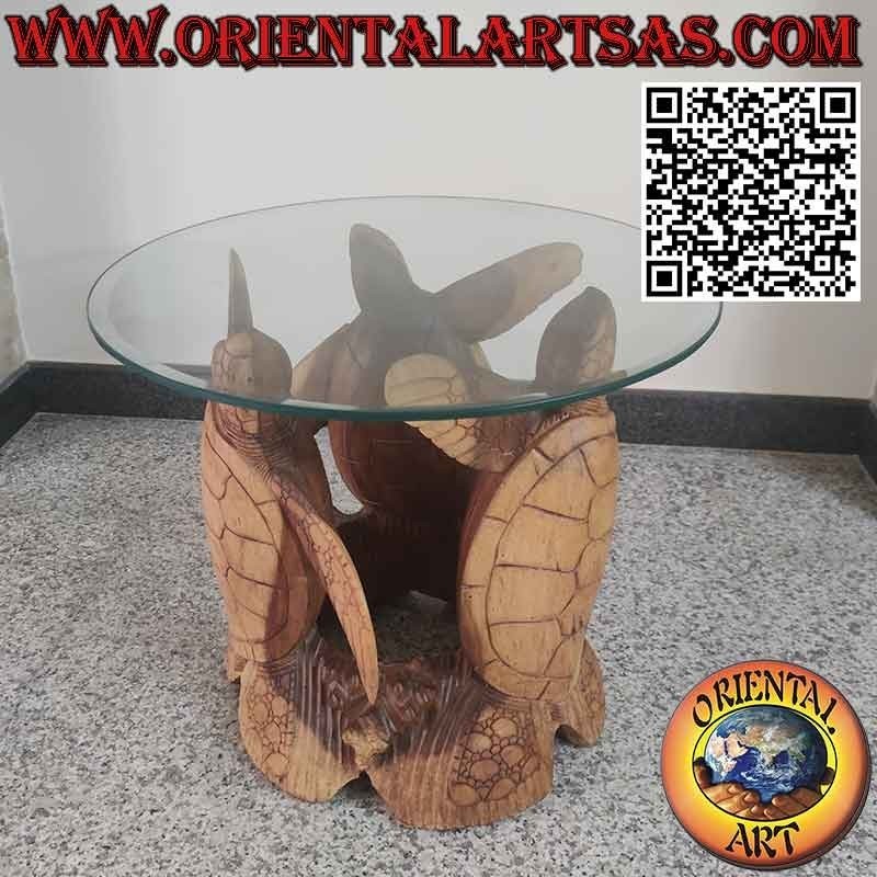 Table ronde aux trois tortues sculptées et plateau en cristal taillé