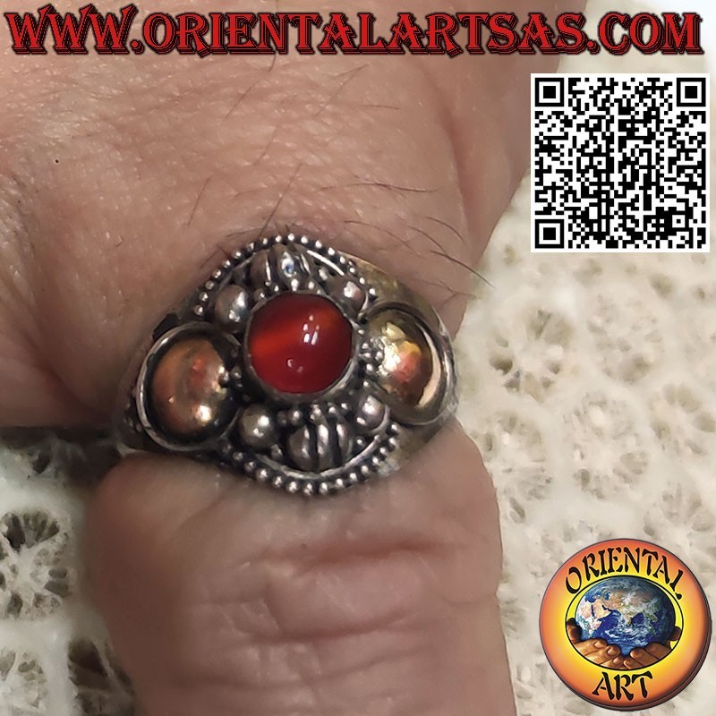 Silver ring with round carnelian and 14 carat gold foil on the sides