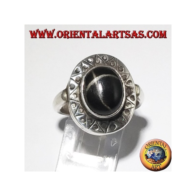 Silver ring with black star with chiselled edge