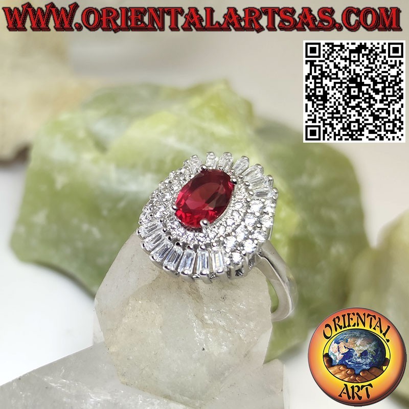 Bague en argent avec rubis ovale entouré de zircons trapézoïdaux et ronds