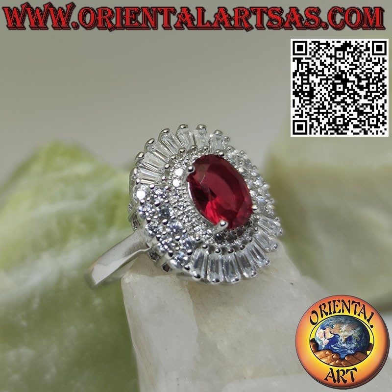 Anello in argento con rubino ovale contornato zirconi a trapezio e tondi