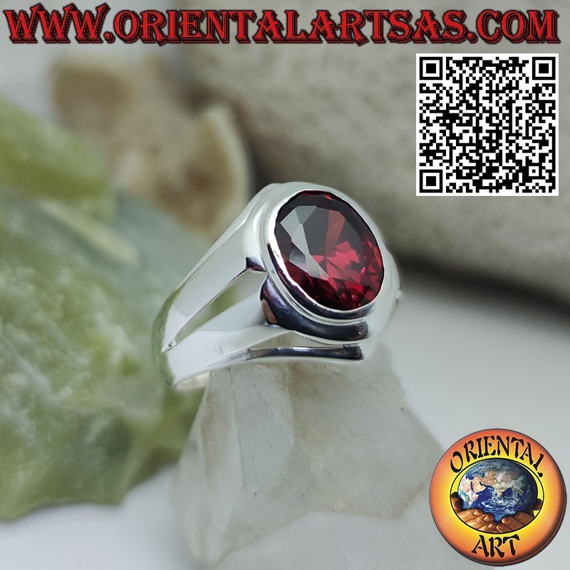 Silver ring with oval garnet and smooth setting and linear holes