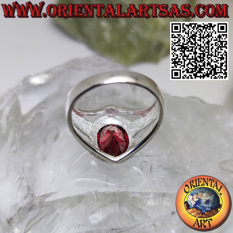 Silver ring with oval garnet and smooth setting and linear holes