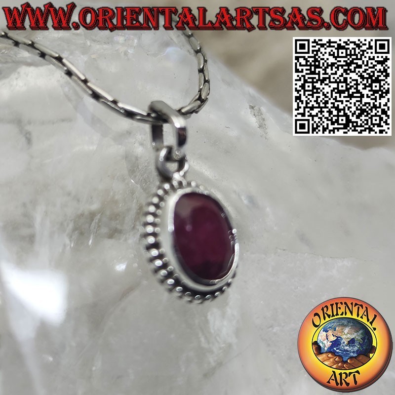 Silver pendant with oval natural ruby surrounded by dots