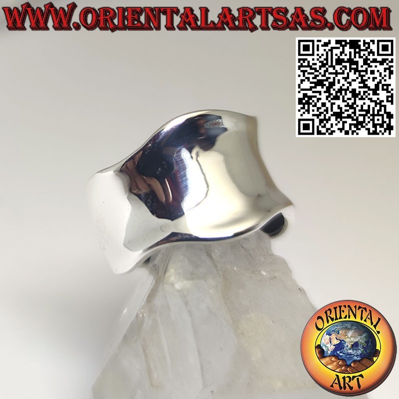 Silver ring with a wide concave and smooth band with a wavy edge