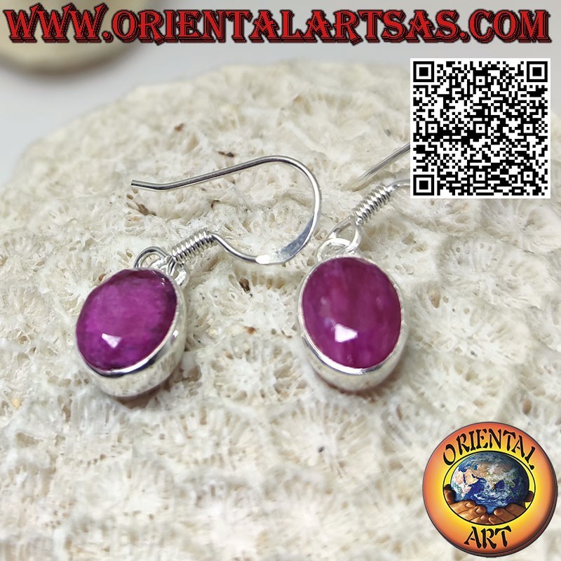Dangling silver earrings with oval natural rubies set
