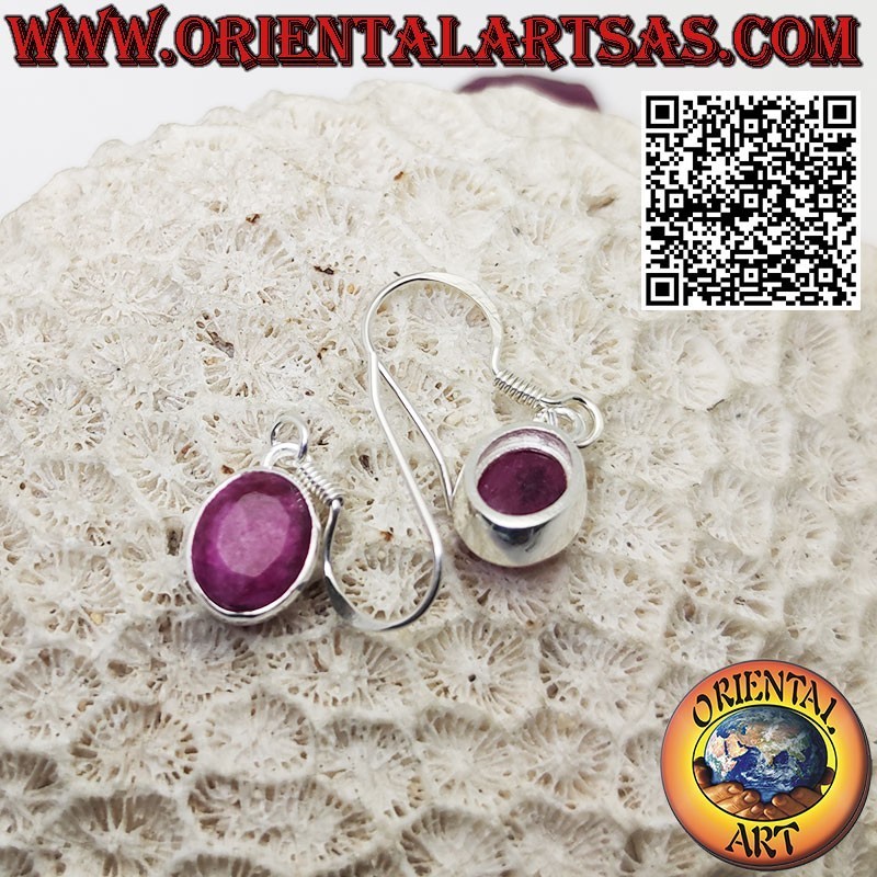 Dangling silver earrings with oval natural rubies set