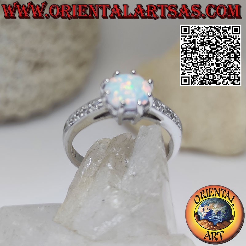 Bague en argent avec sertie d'opales arlequin rondes et bande de zircons sur les côtés