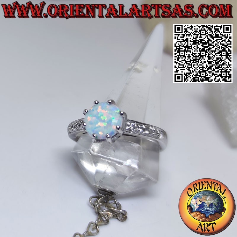 Silver ring with round harlequin opal and zircon band on the sides