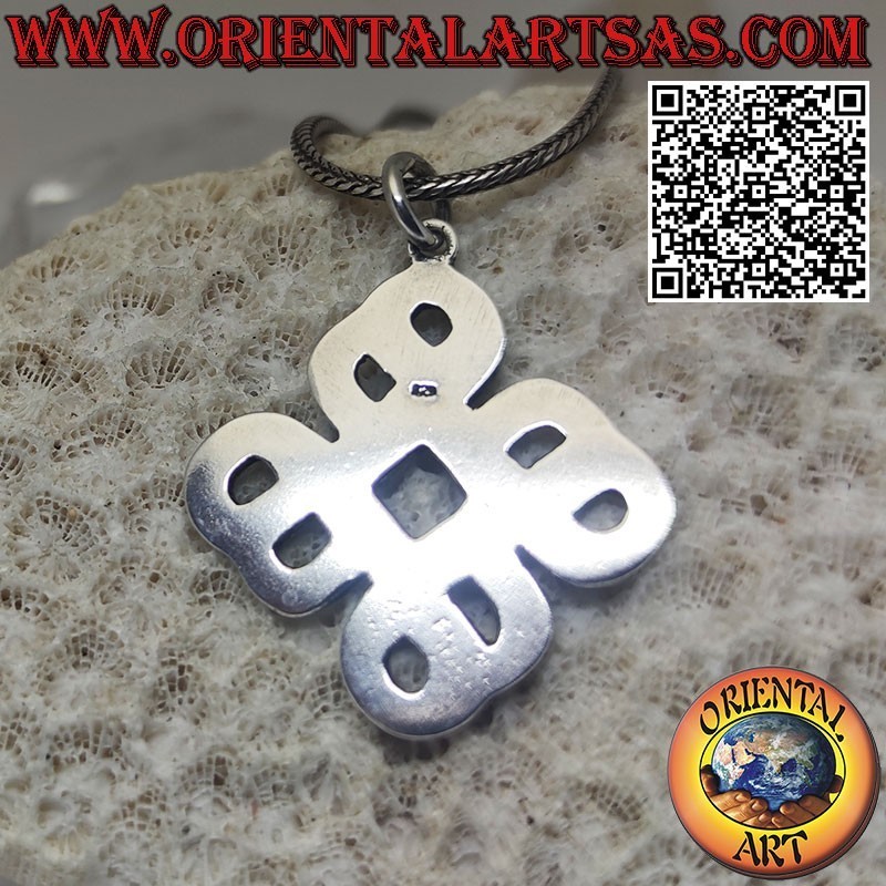 Silver pendant in the shape of a Tibetan Srivatsa infinity knot, symbol of wisdom and harmony
