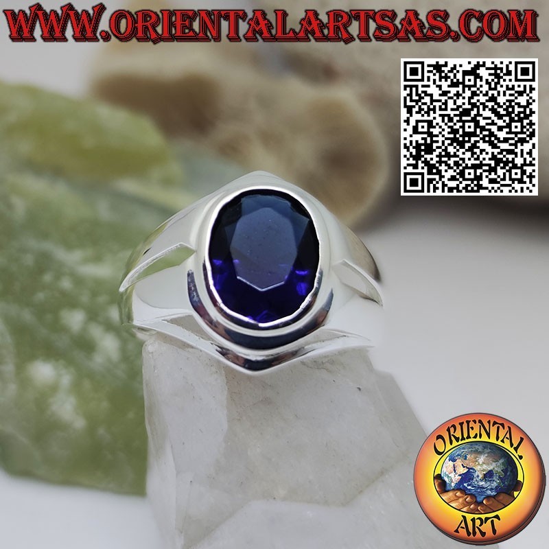 Silver ring with oval faceted synthetic sapphire on a smooth setting