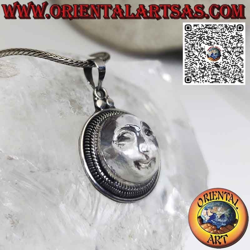 Pendentif soleil en argent sculpté sur cristal de roche, bord large