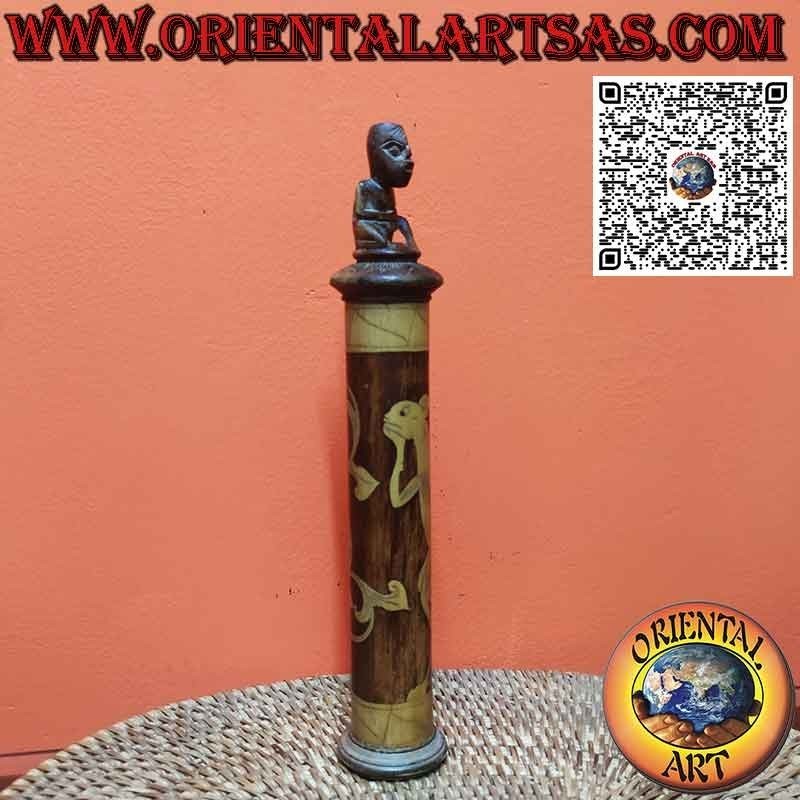 Ancient bamboo medicine container and Batak cap sculpture
