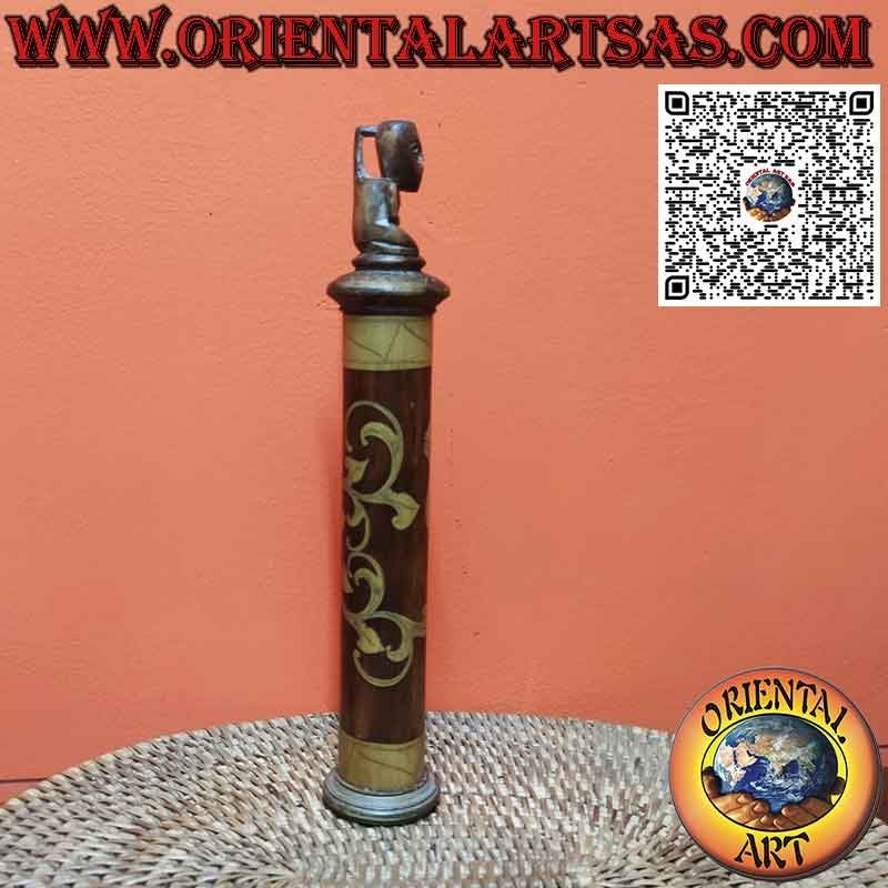 Ancient bamboo medicine container and Batak cap sculpture