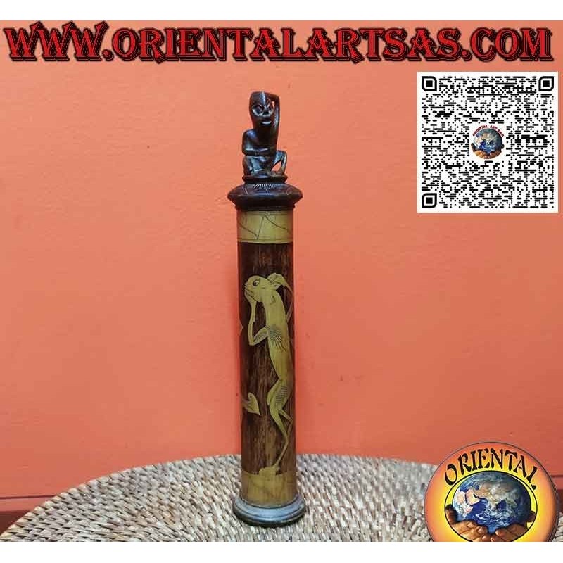 Ancient bamboo medicine container and Batak cap sculpture