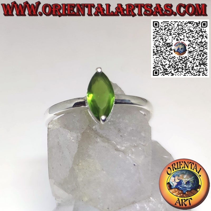 Silver ring set with faceted shuttle peridot