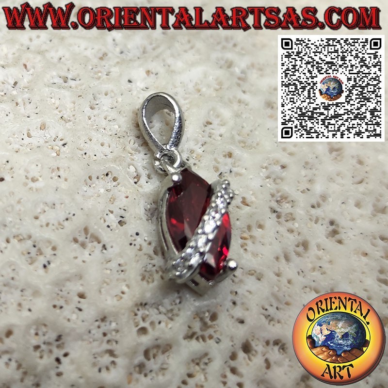 Silver pendant with shuttle garnet topped with zircons