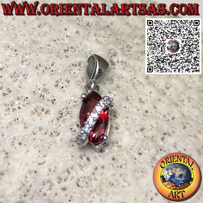 Silver pendant with shuttle garnet topped with zircons