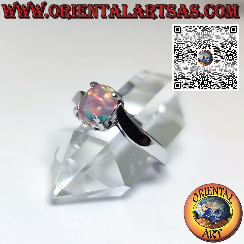 Silver ring with oval harlequin opal and asymmetric setting