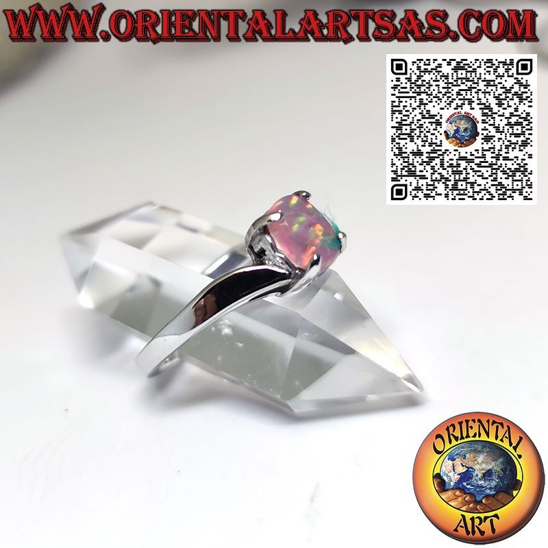 Silver ring with oval harlequin opal and asymmetric setting