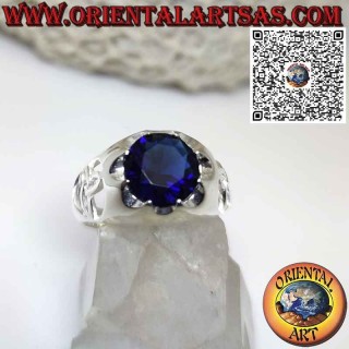 Silver ring with round synthetic sapphire and tyrone knot on the sides