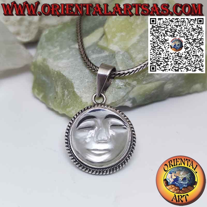 Silver sun pendant carved on rock crystal with edge