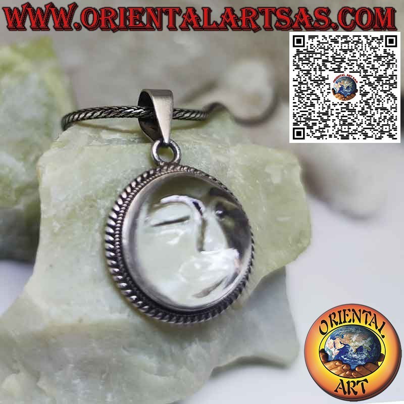 Silver sun pendant carved on rock crystal with edge