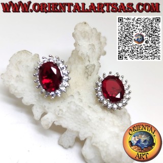 Boucles d'oreilles lobe en argent avec grenat ovale entouré de zircons