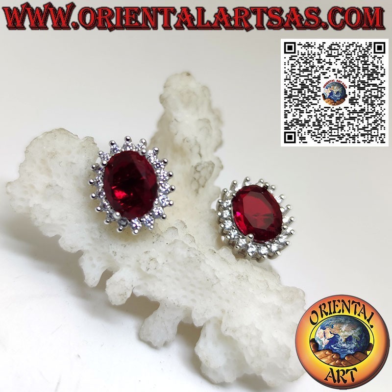 Silver lobe earrings with oval garnet surrounded by zircons