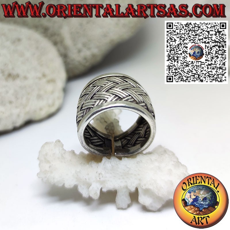 Silver ring with a wide rounded band woven by the Karen