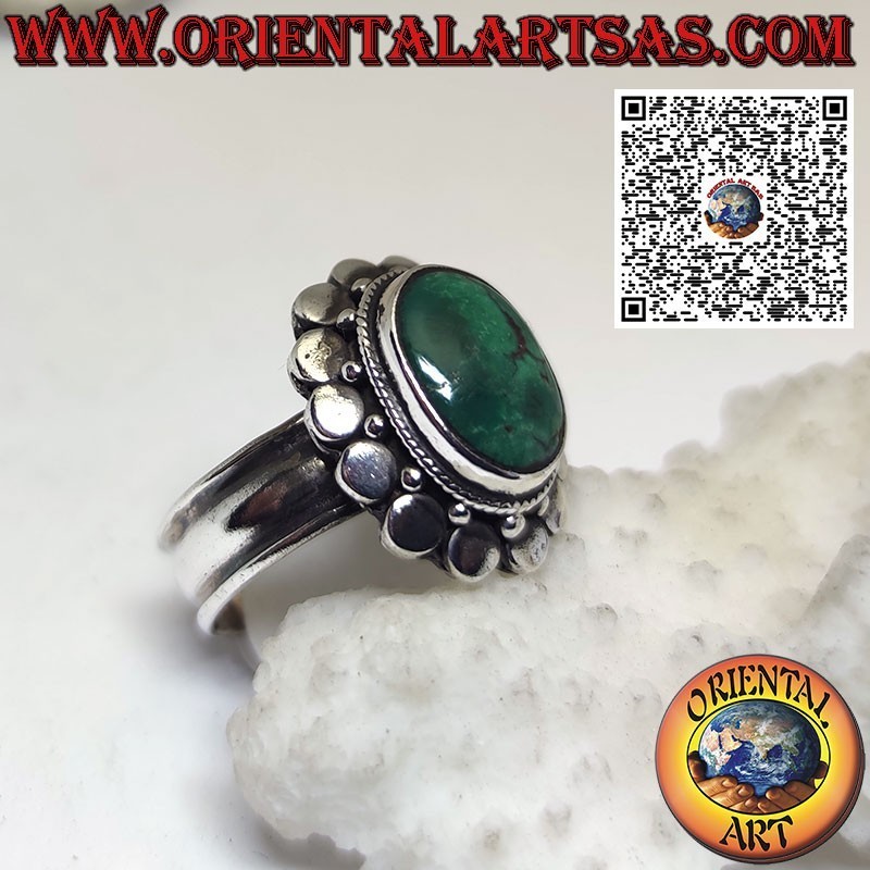 Silver ring with oval ancient Tibetan turquoise surrounded by studs