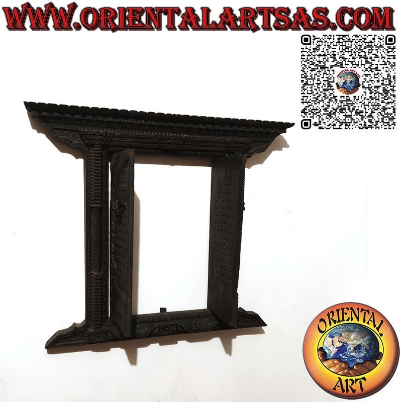 Small and ancient carved wooden 2-panel window Bhaktapur Nepal