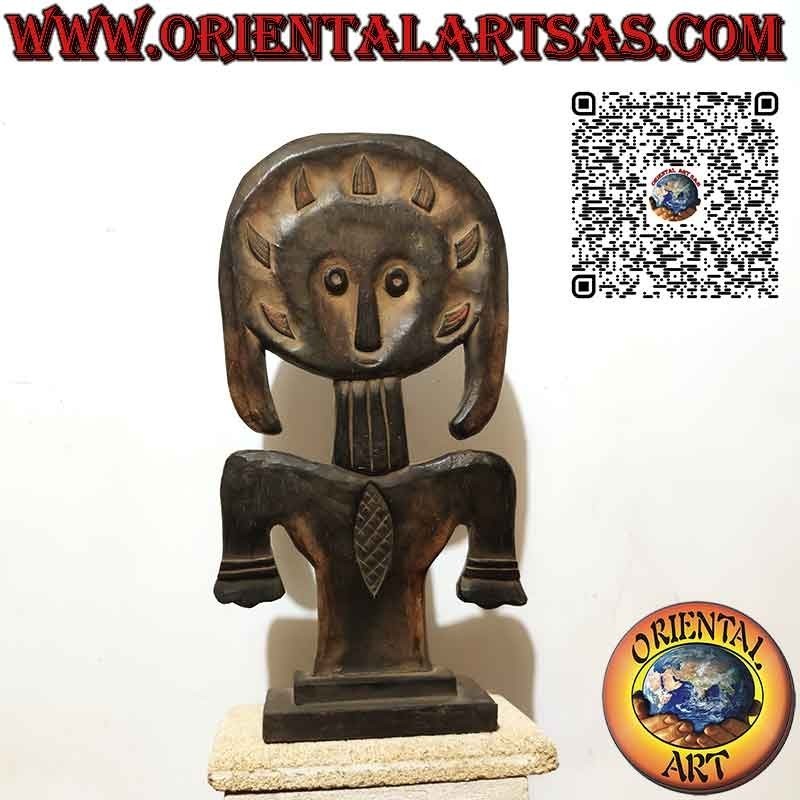 Totem papou représentant une ancienne divinité ancestrale primitive