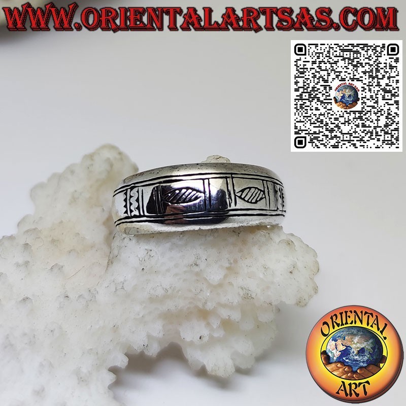Silver crescent band ring with handmade geometric engravings