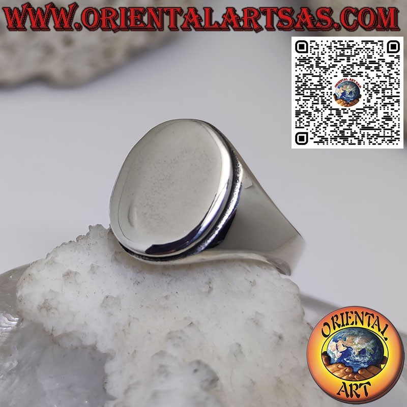 Smooth oval silver ring with chevalier style raised base