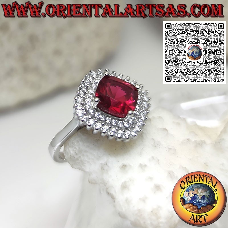 Silver ring with synthetic ruby surrounded by 2 rows of zircons