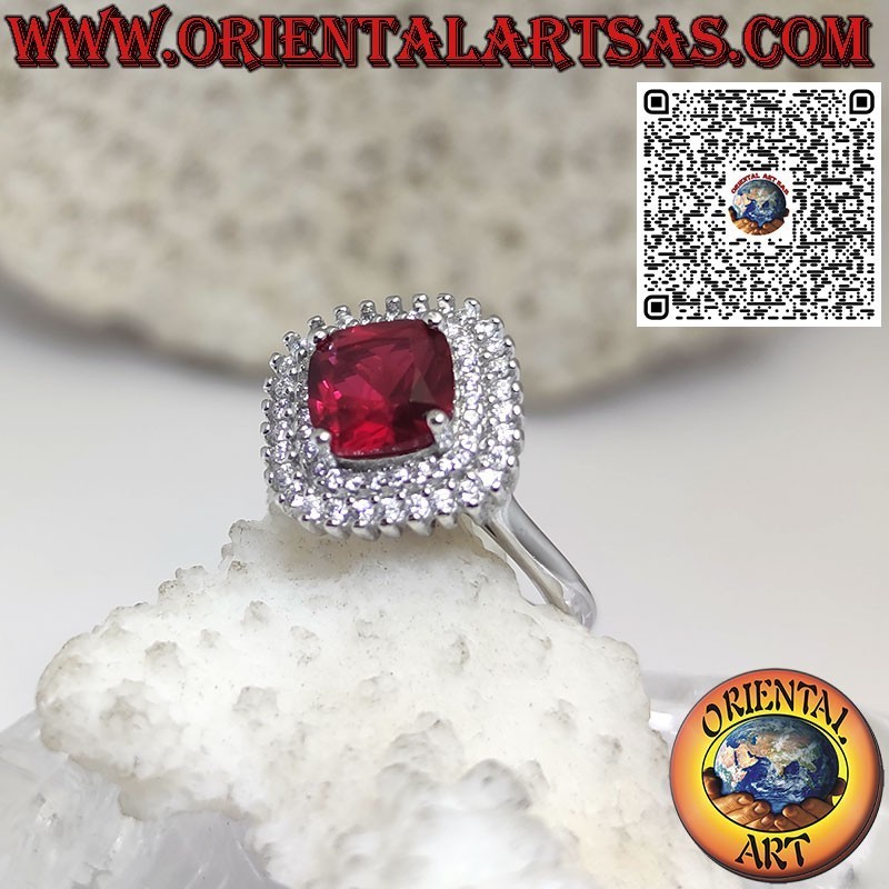Silver ring with synthetic ruby surrounded by 2 rows of zircons