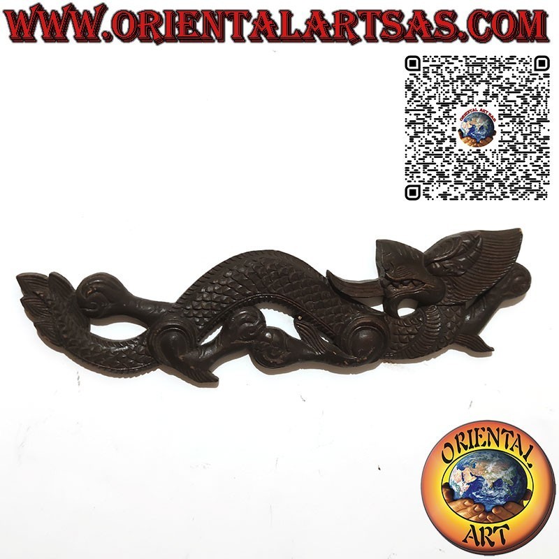 Dragon the wooden wall made by hand in the mid-20th century in Nepal