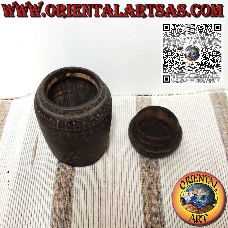 Ancient cylindrical wooden and bamboo container engraved by Dayak Borneo