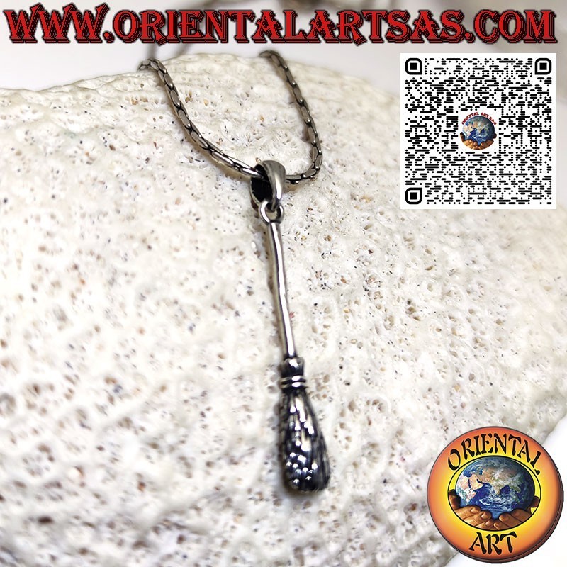 Silver pendant of the witch's broom wards off negative energies