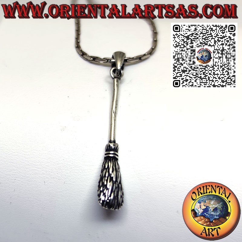 Silver pendant of the witch's broom wards off negative energies