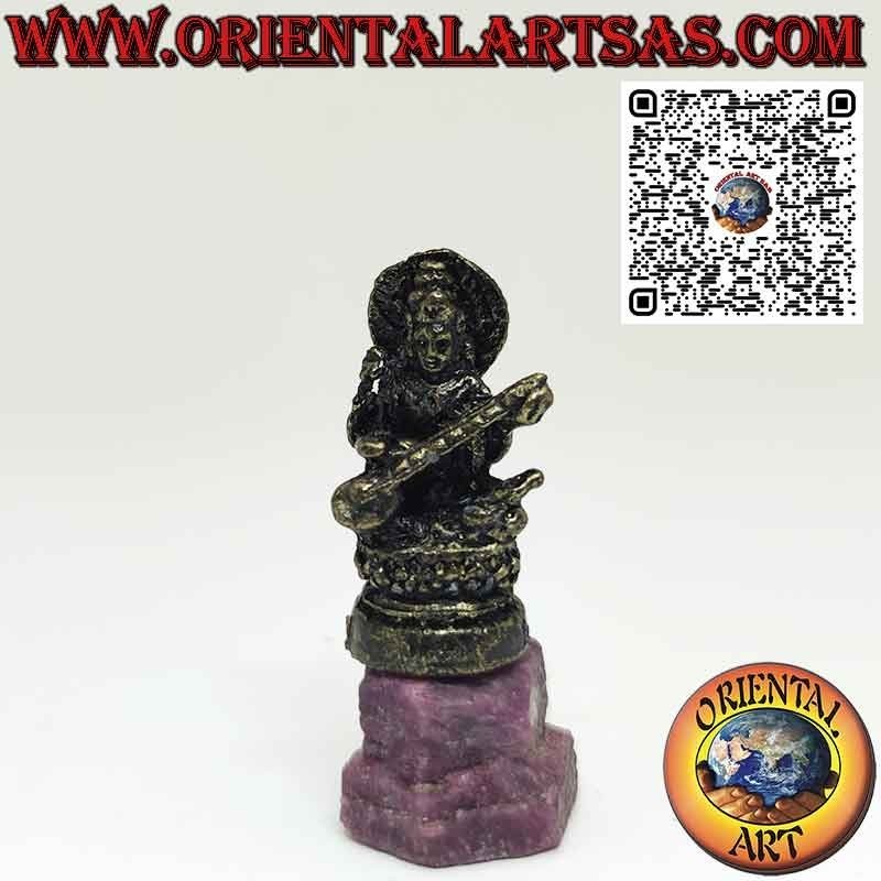 Brass figurine of Saraswati consort of Brahma measuring 3.3 cm