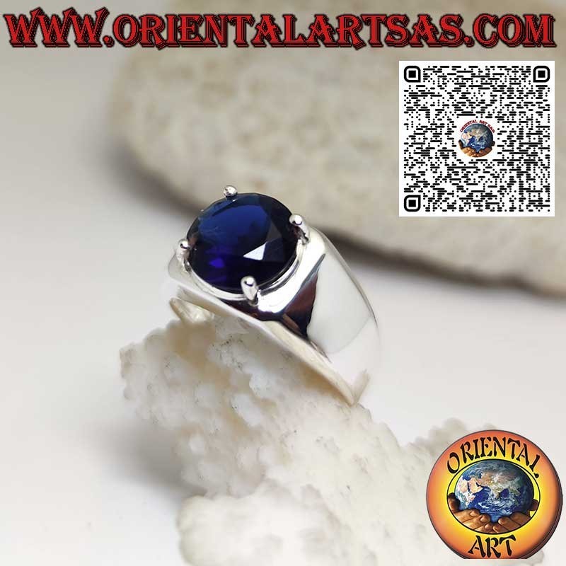 Silver ring with round synthetic Sapphire set with 4 prongs