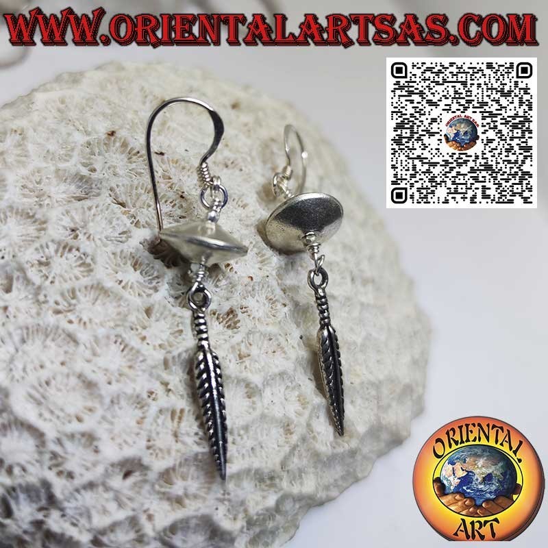 Silver earrings in the shape of a flying saucer spinning top with hanging feather