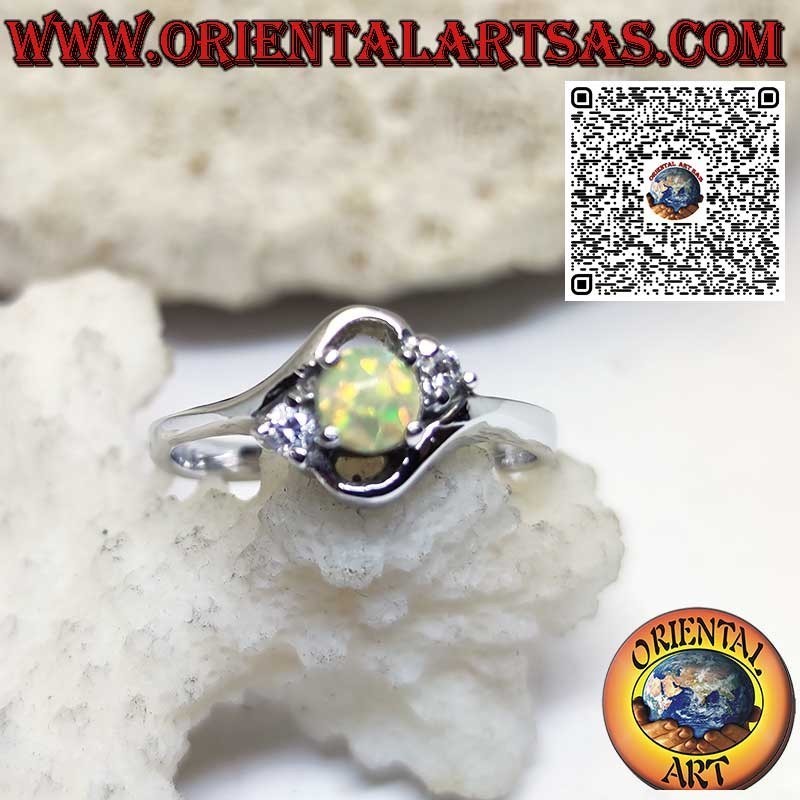 Bague oblique en argent avec opale arlequin ronde et deux zircons